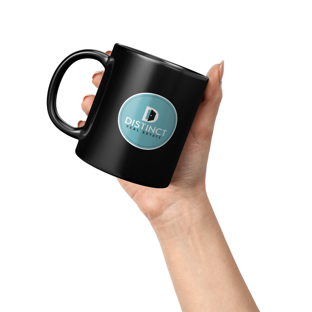 Black_mug_with_circle_logo_Lifestyle_Raised_Hand_LH_Mockup.png