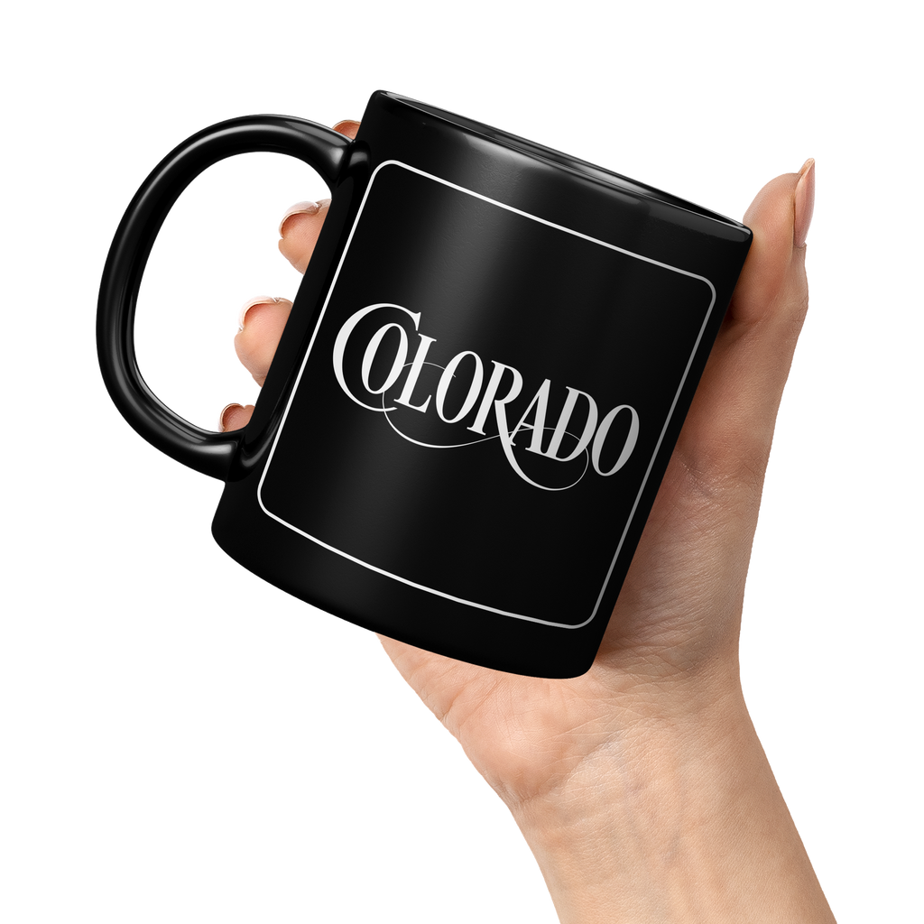Colorado_Script_-_11oz_black_mug_11oz_Black_LH_Model_Mockup.png