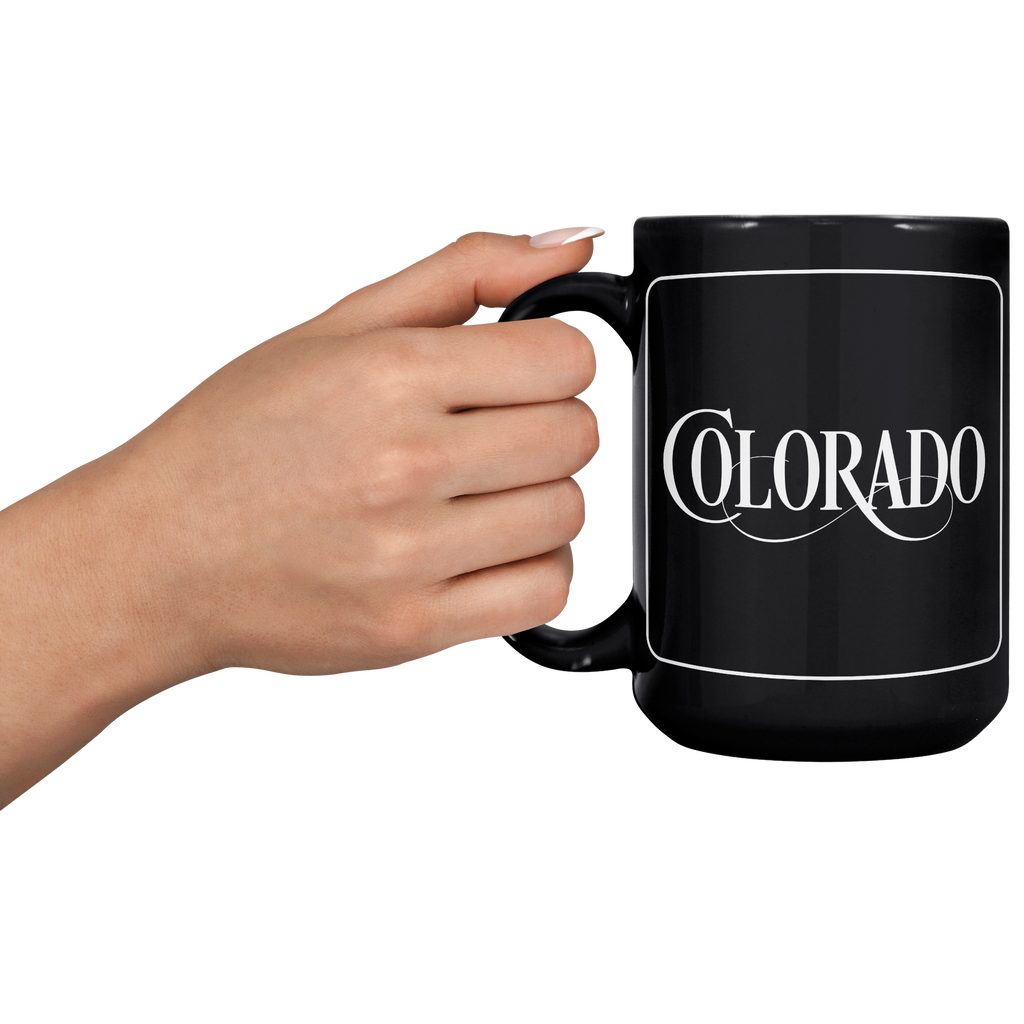 Colorado_Script_-_15oz_black_mug_15oz_Black_LH_Model_Mockup.png