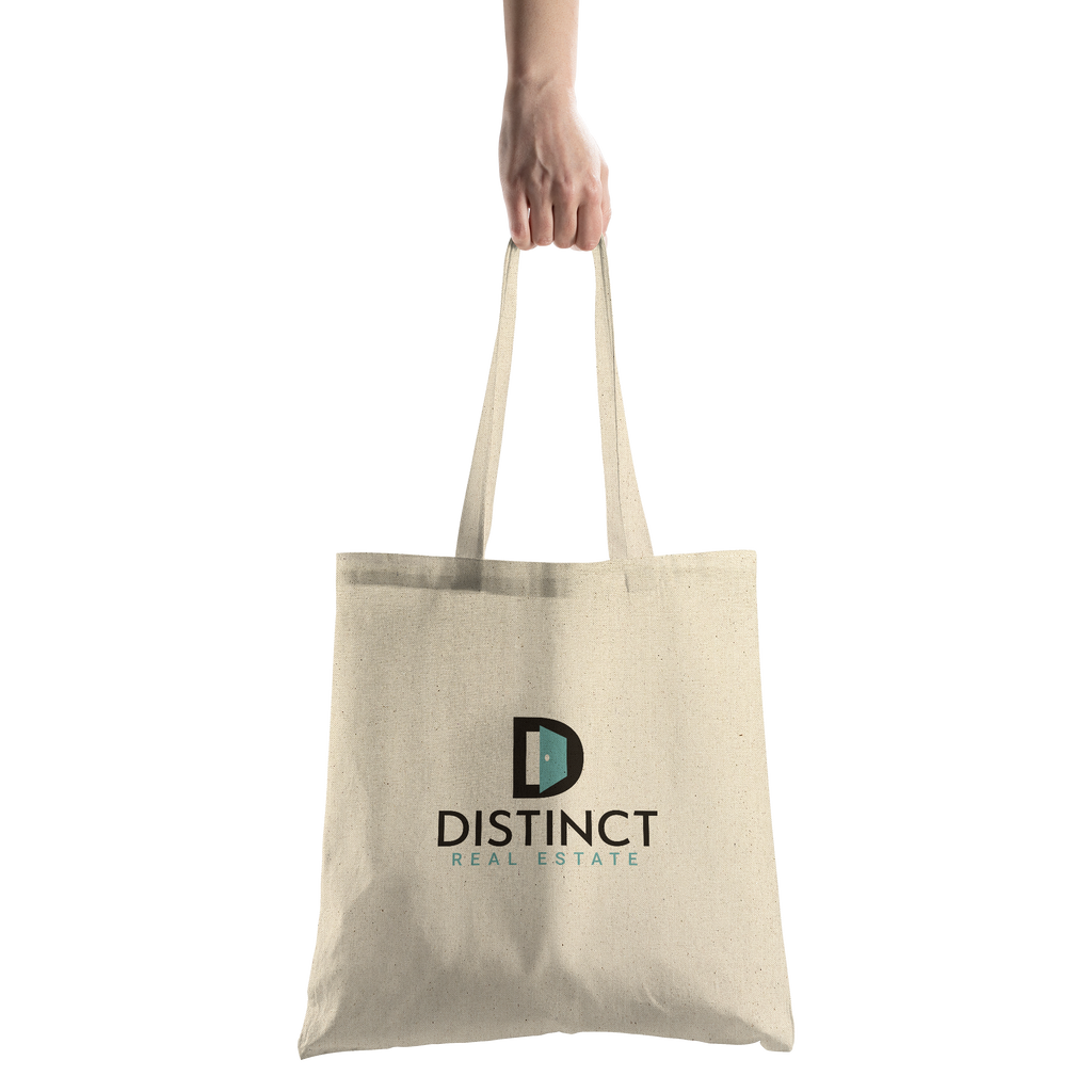 Distinct_-_15x15_Cotton_Tote_with_logo_CottonTote_S_HandTransparent_Mockup.png