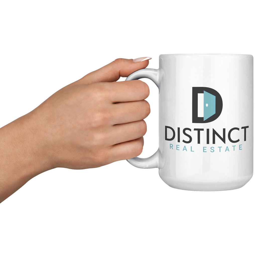 Distinct_Real_Estate_-_15oz_white_mug_15oz_White_LH_Model_Mockup.png