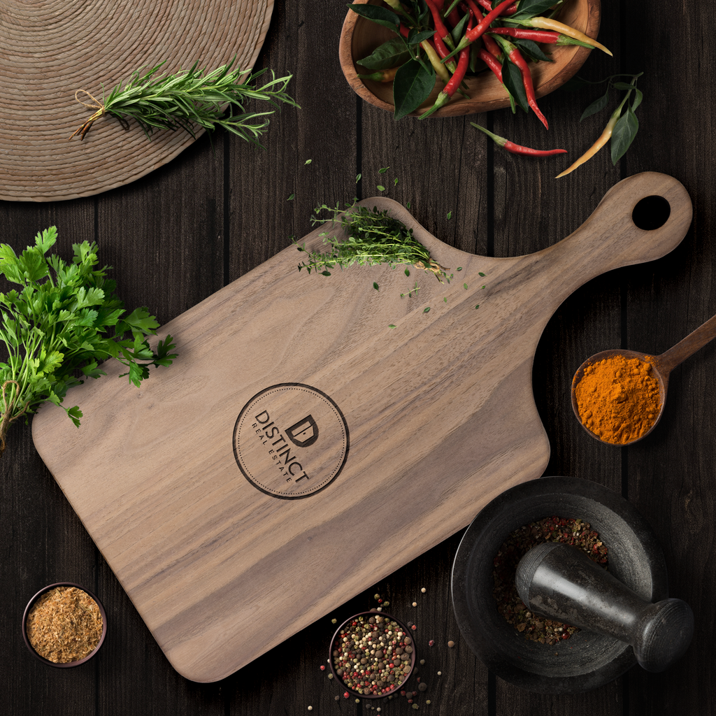 Hardwood_Paddle_Cutting_Board_with_circl_Dark_Handle_V_Lifestyle_Mockup.png