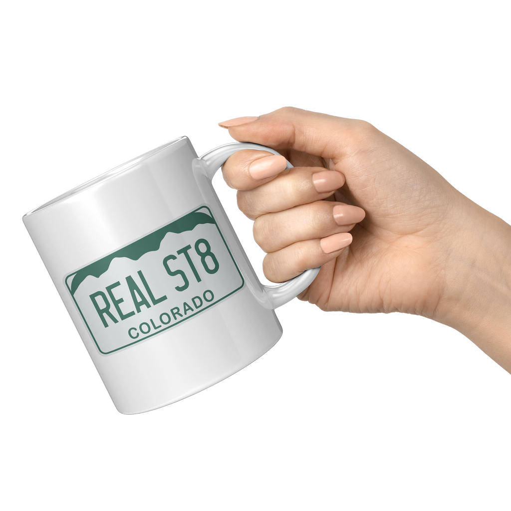 Real_St8_license_-_11oz_white_mug_11oz_White_RH_Model_Mockup.png