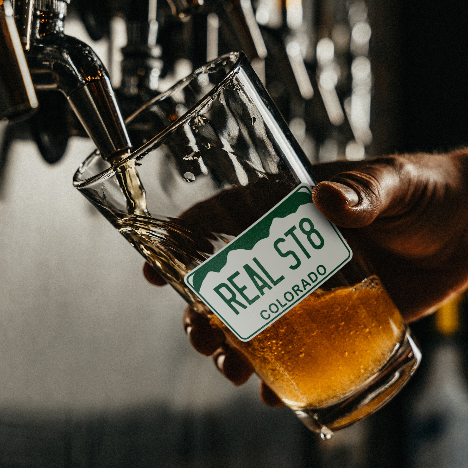 Real_St8_license_-_16oz_pint_glass_Pint_Glass_Dark_Lifestyle_Mockup.png