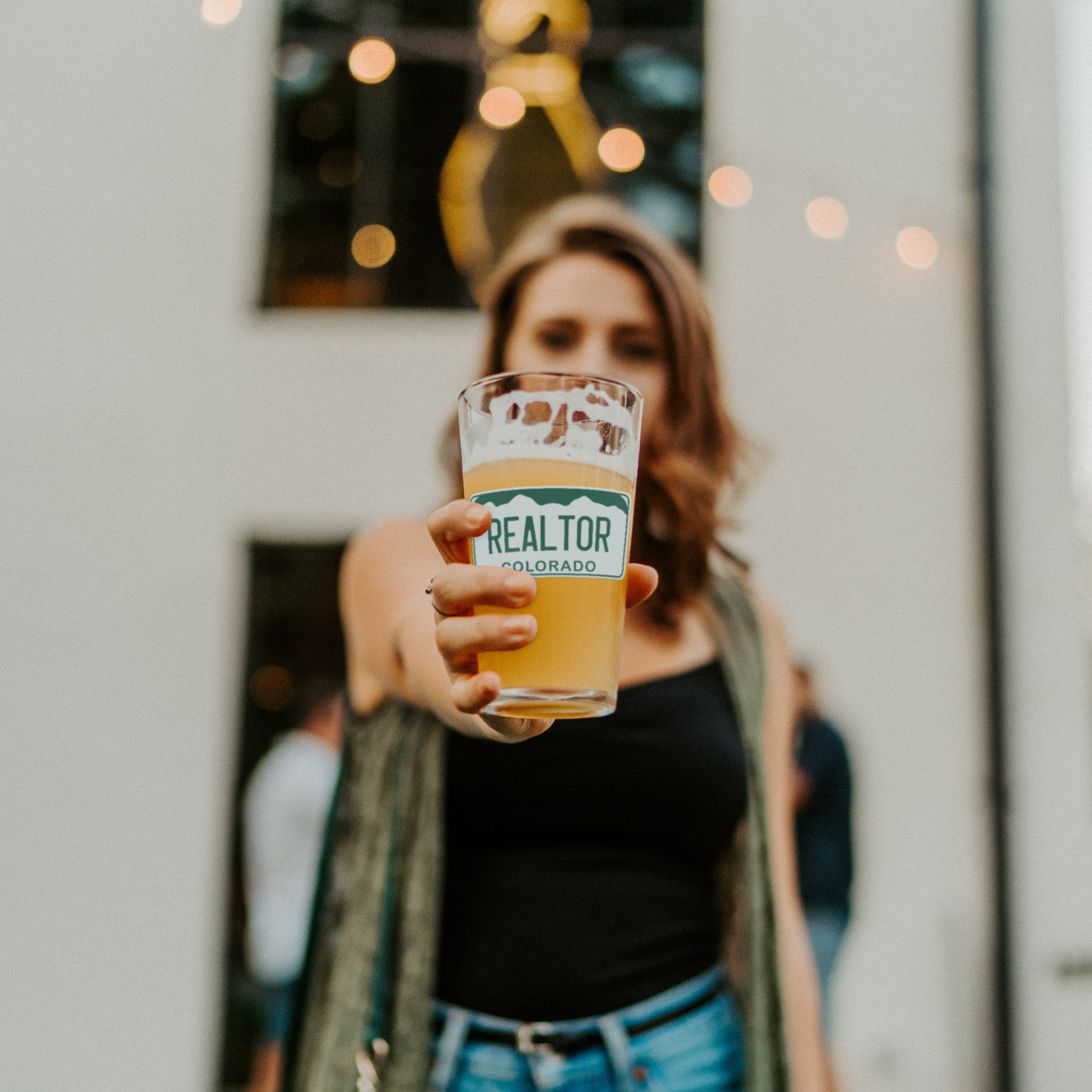 Realtor_license_-_16oz_pint_glass_Pint_Glass_Model_Lifestyle_Mockup.png