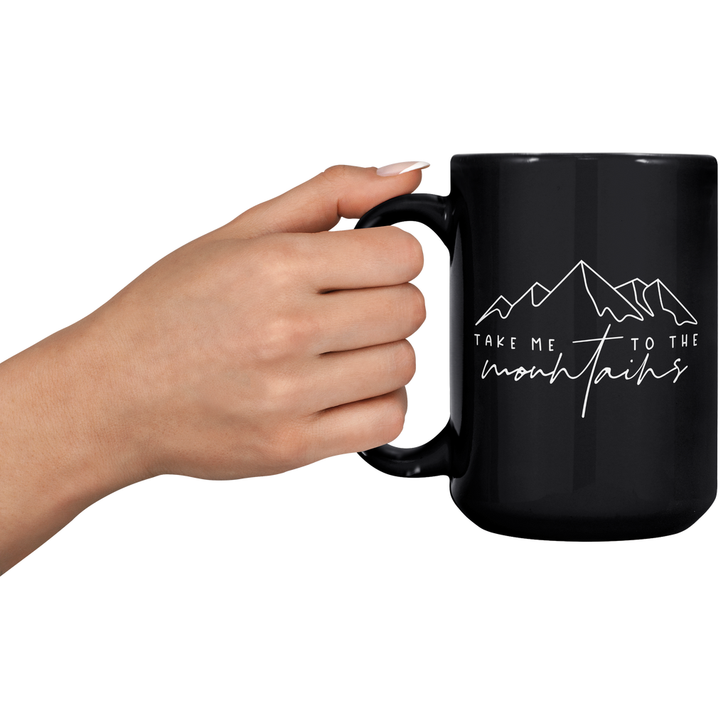 Take_me_to_mtns_-_15oz_black_mug_15oz_Black_LH_Model_Mockup.png